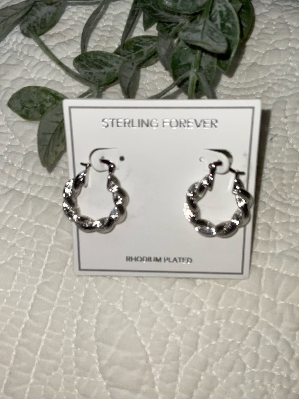 Sterling Forever Rhodium Plated Twisted Hoop Earrings in Silver